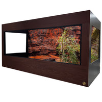 Toad Ranch enclosure featuring Mahogany front frame, black PVC body panels, lookout windows and a Destination Background.