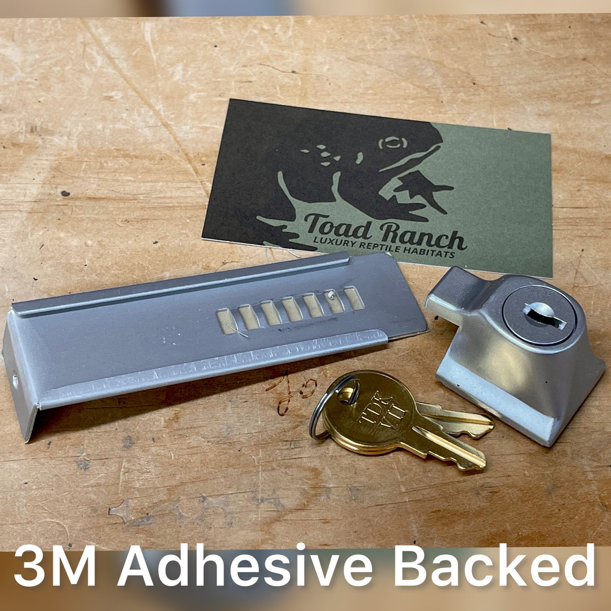 Reptile Enclosure Lock. Adhesive Backed.